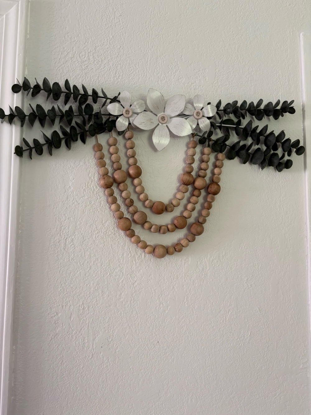 Wood Bead Garland Wall Hanging with Floral Accent - Natural Wood